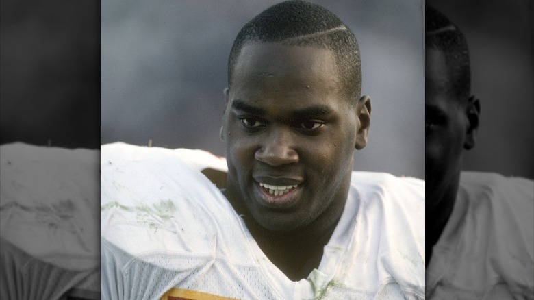 Derrick Thomas smiling, on field