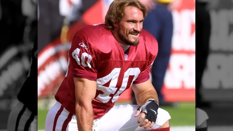 Pat Tillman kneeling on field