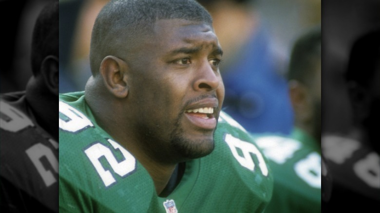 Reggie White mouth open, smiling