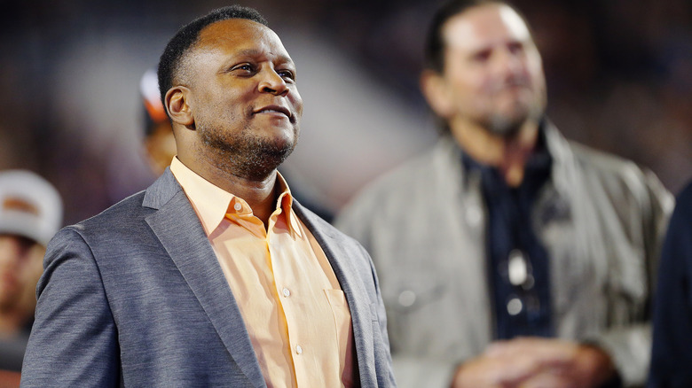 Barry Sanders looking up grey suit