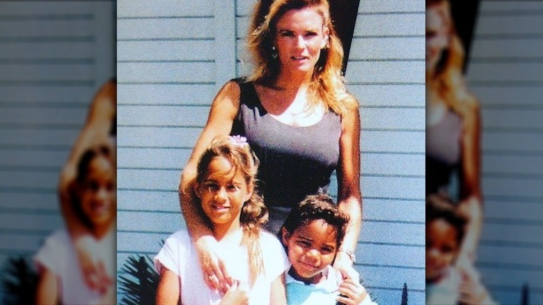 Nicole Brown Simpson posing with kids