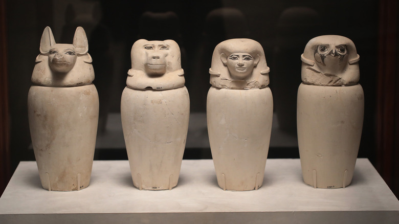 Four ancient Egyptian canopic jars