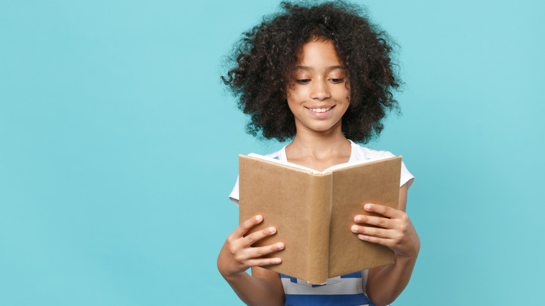 girl reading a book