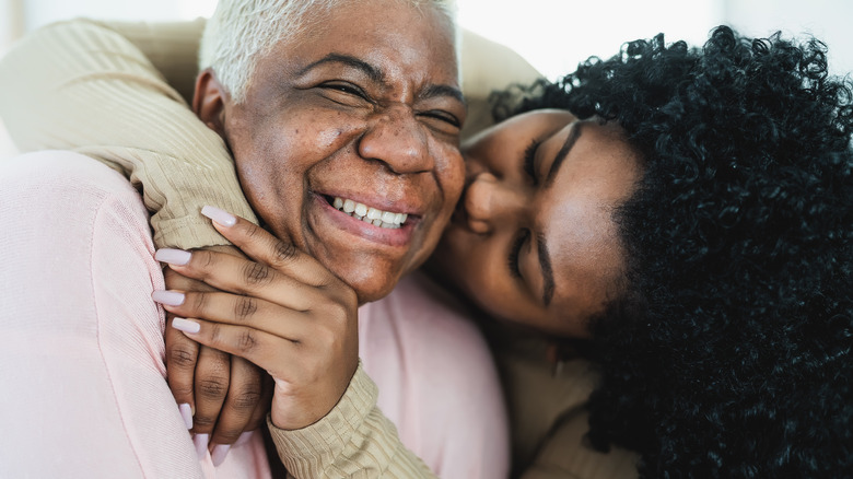 parent and child happy hugging