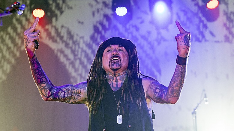 Al Jourgensen tattoos dreadlocks performing onstage