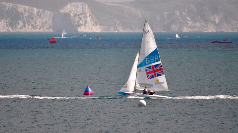 Andrew Simpson and Iain Percy in sailboat water