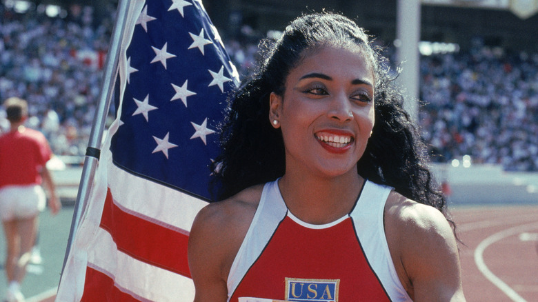 Florence Griffith Joyner smiling American flag