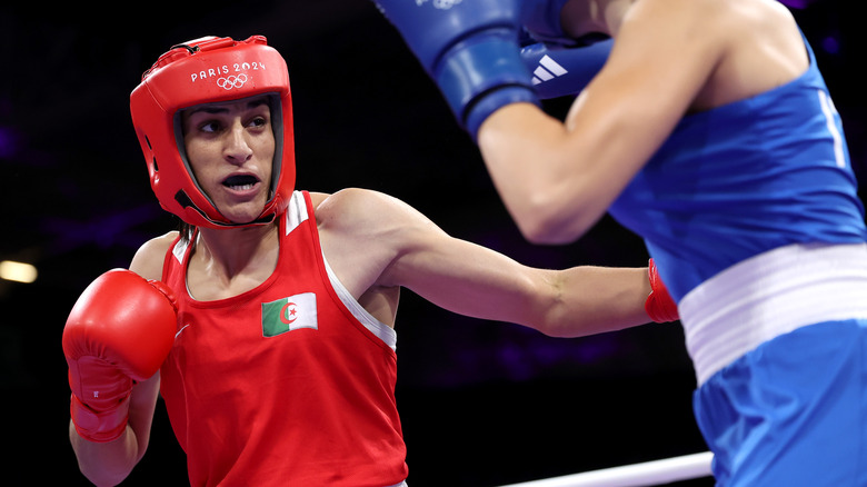 Imane Khelif red boxing gloves headgear