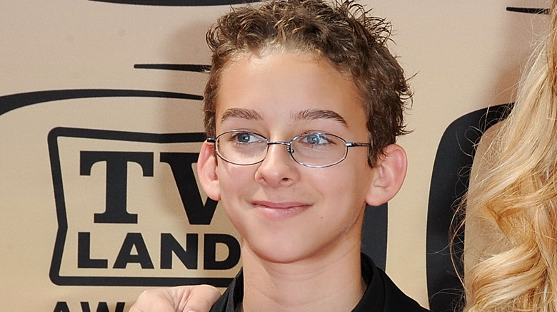 sawyer sweeten smirking looking off