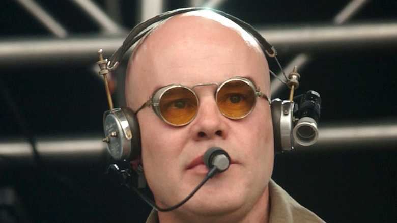 Thomas Dolby performing wearing headphones