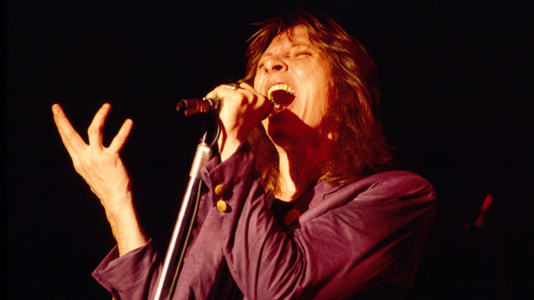 Benny Mardones long hair singing microphone