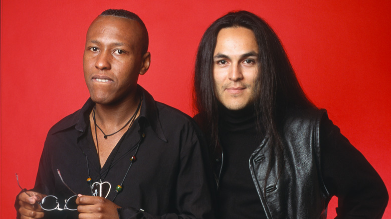 Charles and Eddie posing red background