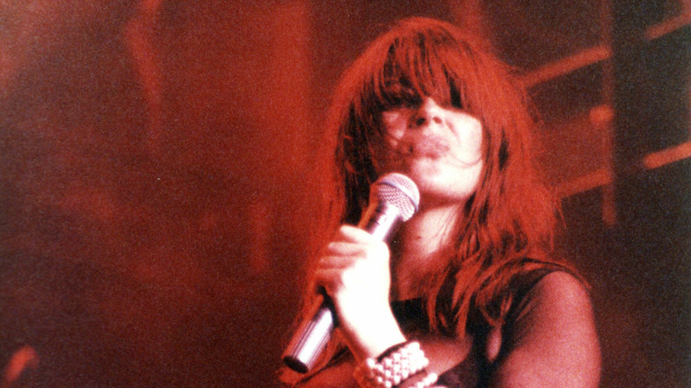 Chrissy Amphlett red hair singing into mic