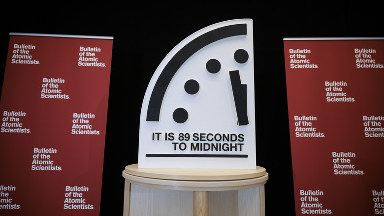 Model of Doomsday Clock with words "It is 89 seconds to midnight."