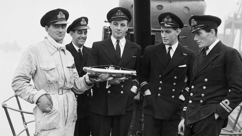 officers in uniform on submarine