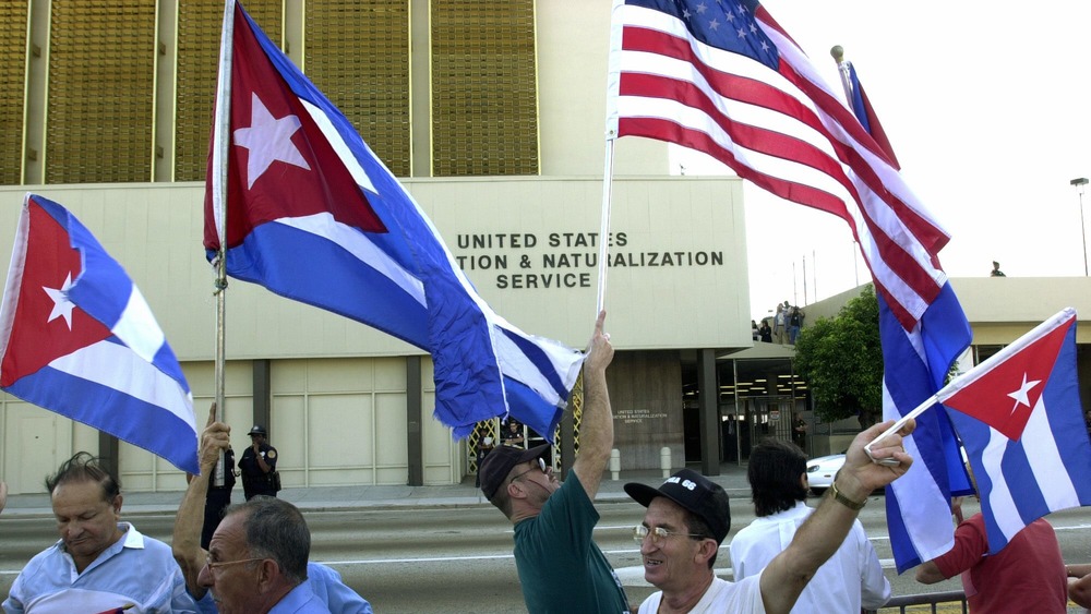 Cuban protestors holding flags