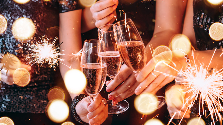 women celebrating with wine