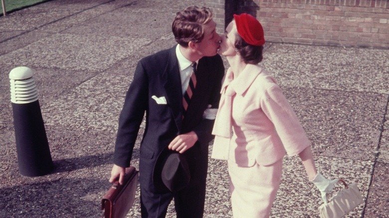 Couple kissing in public in 1954