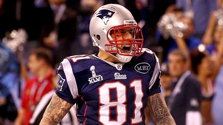 Aaron Hernandez running with ball