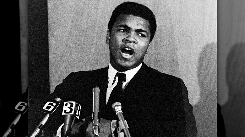 Ali speaking at press conference