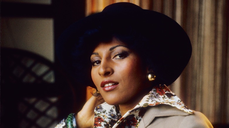 Pam Grier in a hat