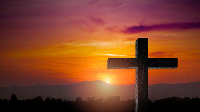 Cross with sunset background