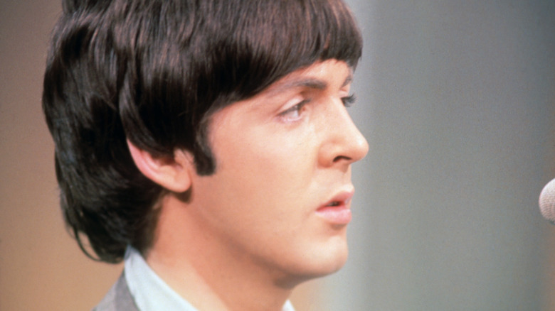 Paul McCartney staring to side