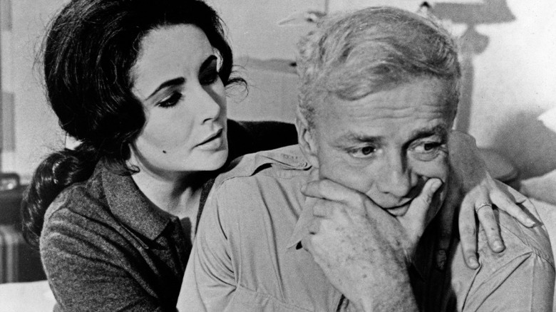 Elizabeth Taylor comforting Brian Keith 