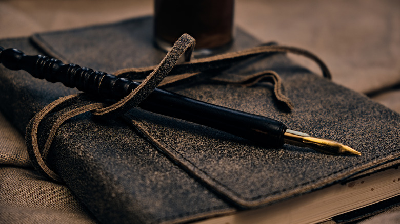 leather journal and pen