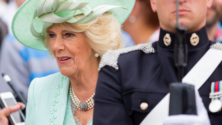 Camilla Parker Bowles in green hat