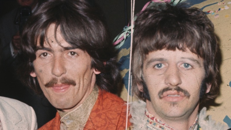 George Harrison and Ringo Starr grinning