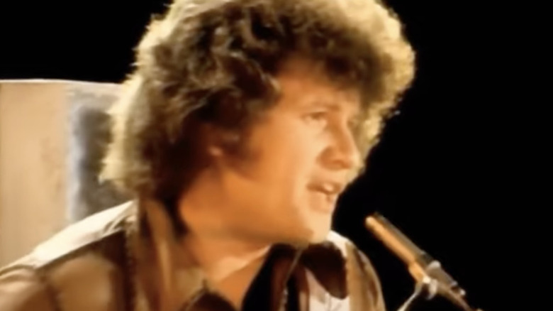 Terry Jacks singing "Seasons in the Sun"