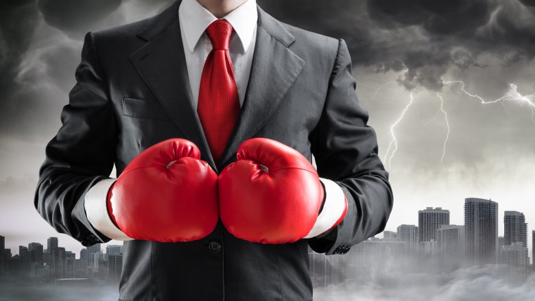 businessman boxing gloves