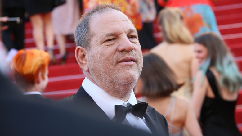 Harvey Weinstein in a crowd of people