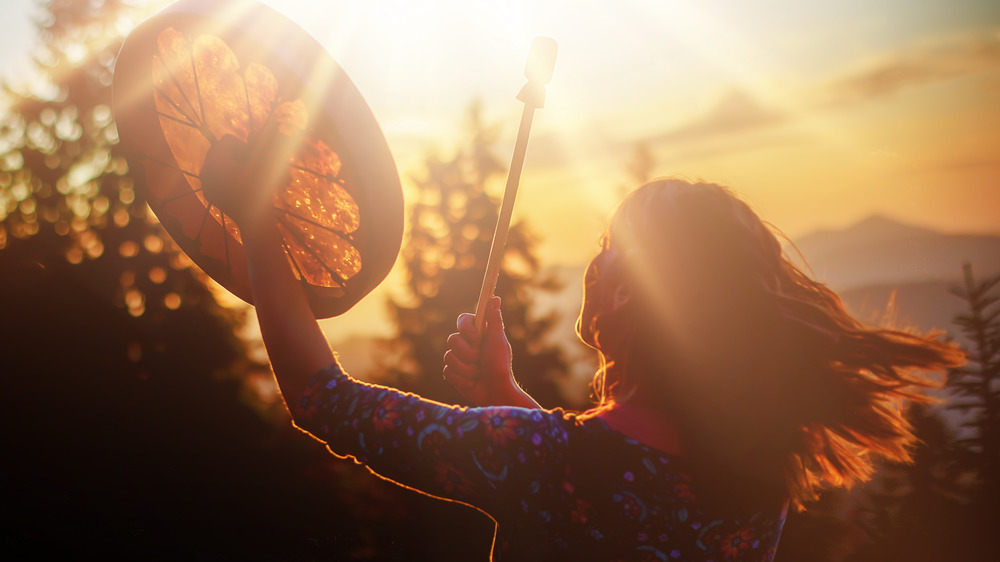 Woman performing shamanistic ritual