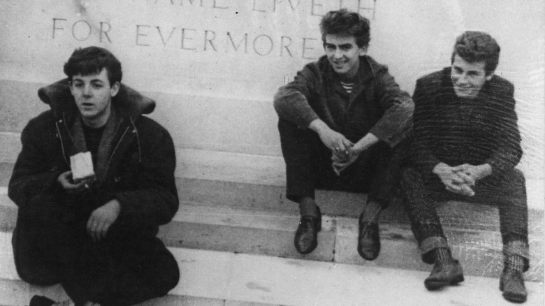 McCartney, Harrison, and Pete Best sitting