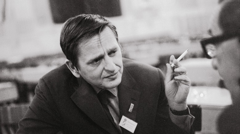 Olaf Palme smoking a cigarette