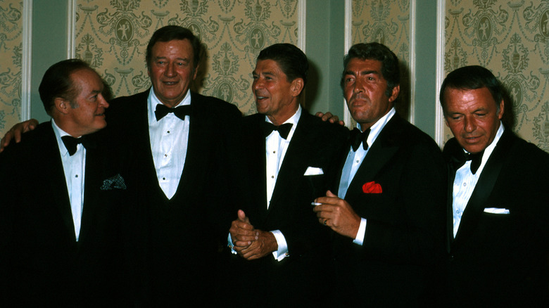 john wayne, frank sinatra, some other men