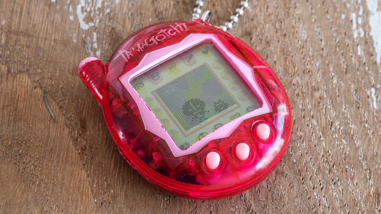 Red Tamagotchi virtual pet