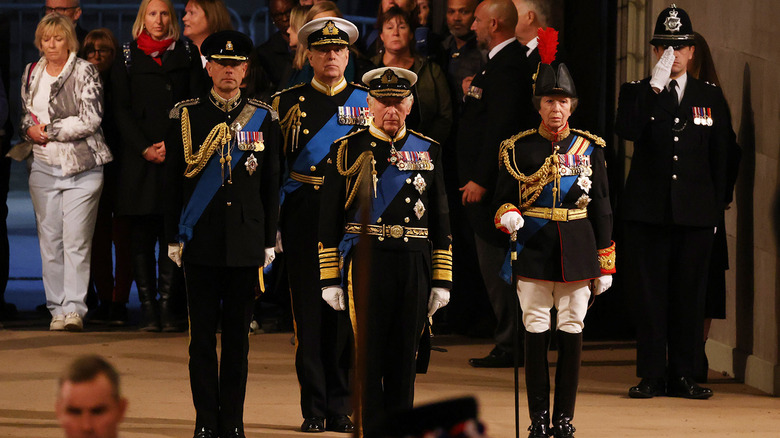 princess anne with her siblings in military uniforms