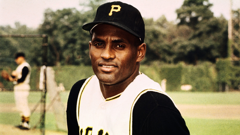 Roberto Clemente posing in a Pirates uniform