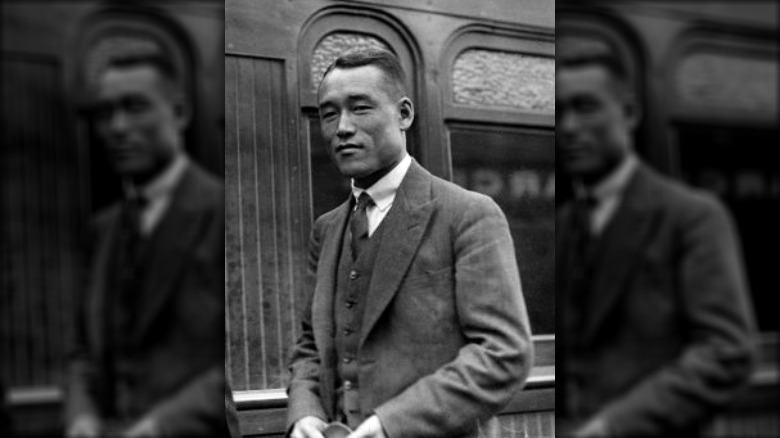 Jiro Sato in three-piece suit