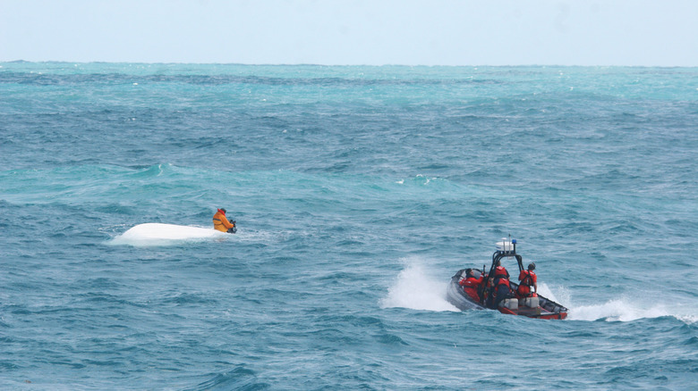 Coast Guard approaching boat to rescue Nick Schuyler