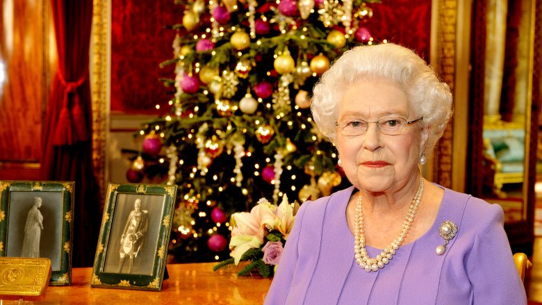 Queen Elizabeth in front of Christmas tree