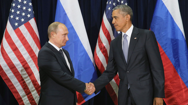 Obama and Putin shaking hands