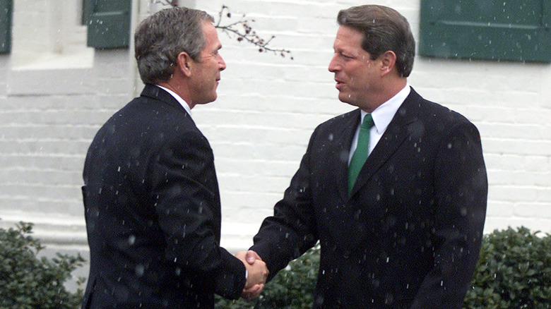 Al Gore and George W Bush shake hands