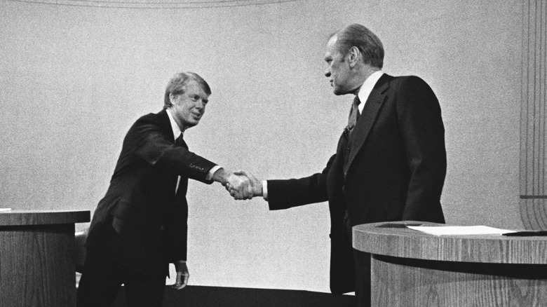 Ford and Carter shake hands