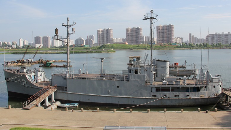 USS Pueblo city behind