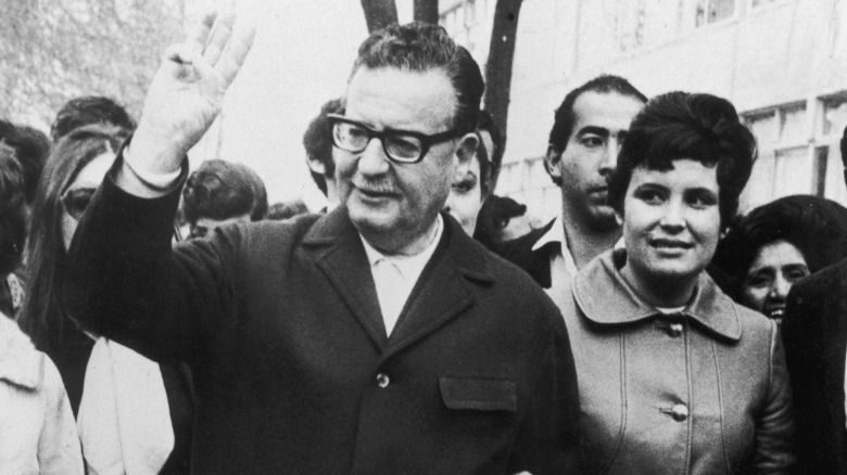 Salvador Allende walking with supporters