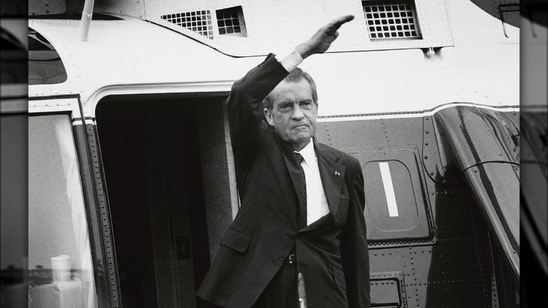 Richard Nixon waving from plane